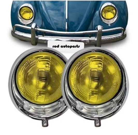 Pair of headlights with yellow glass and casing.