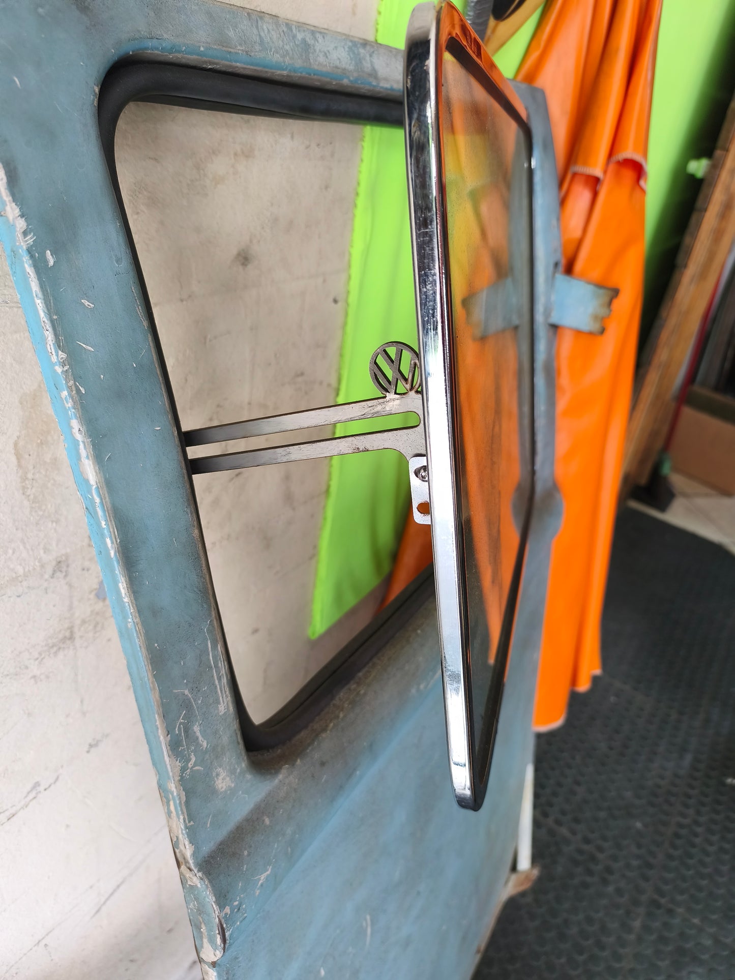 Stainless steel Safari tilting windows with glass and 20cm spacer, VW logo - original glass.
