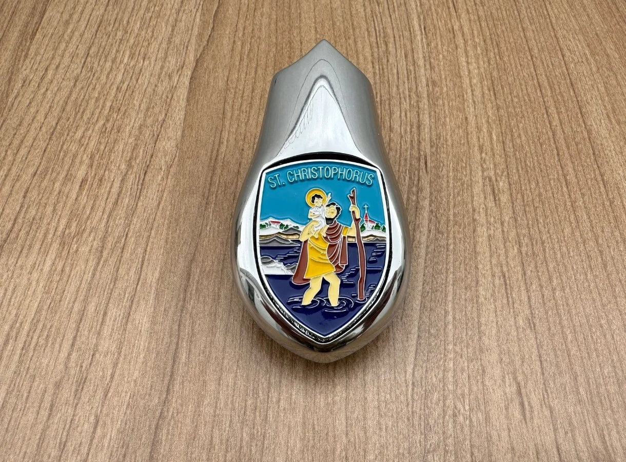 Emblem on the hood of a VW Beetle - Karmann Ghia - Porsche 356 with Jesus Christ
