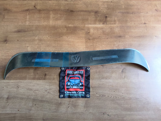 Stainless steel rear window visor for the Volkswagen Beetle; it is rust-resistant and provides protection against sunlight and rain.