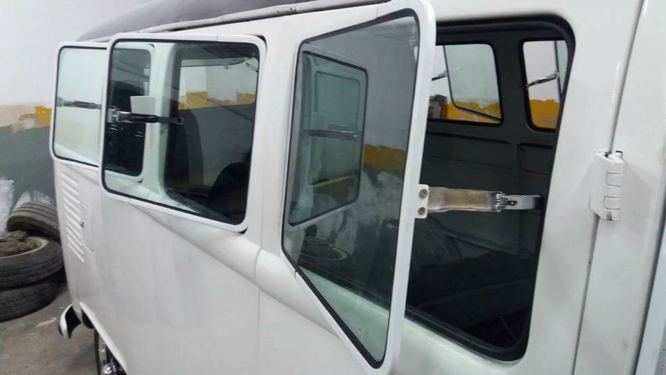 Stainless steel Safari tilting windows with glass and 20cm spacer, VW logo - original glass.